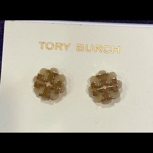 Tory Burch signature logo flower stud earrings.